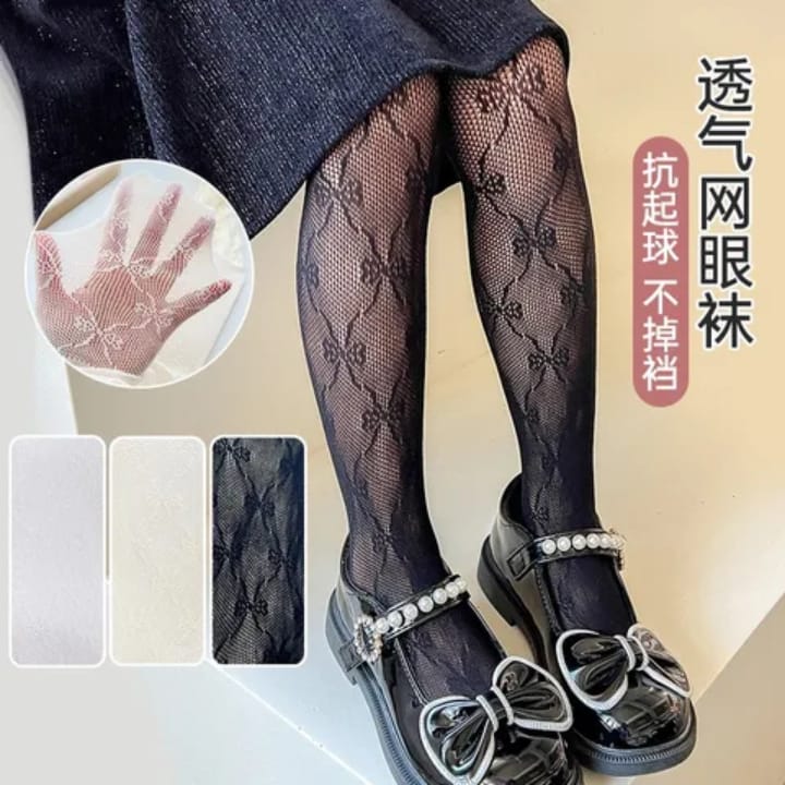 Girls lace fishnet pantyhose in black and white with elastic high waist - soft acrylic kids tights with charming bow and heart patterns for parties and special occasions