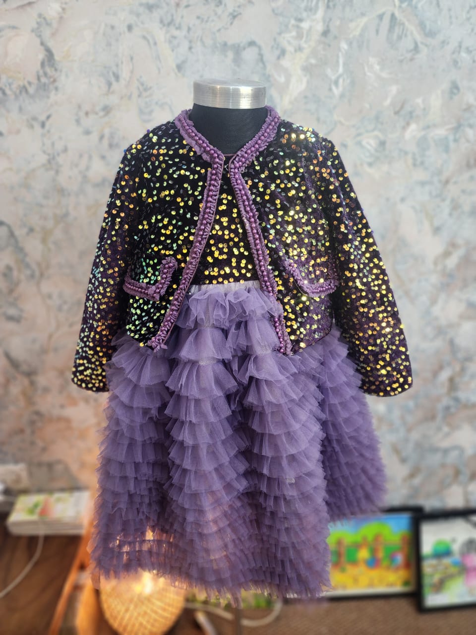 Girls purple multi-layered bushy frock with glamorous sequin jacket featuring gold and jewel tones, elegant winter party dress