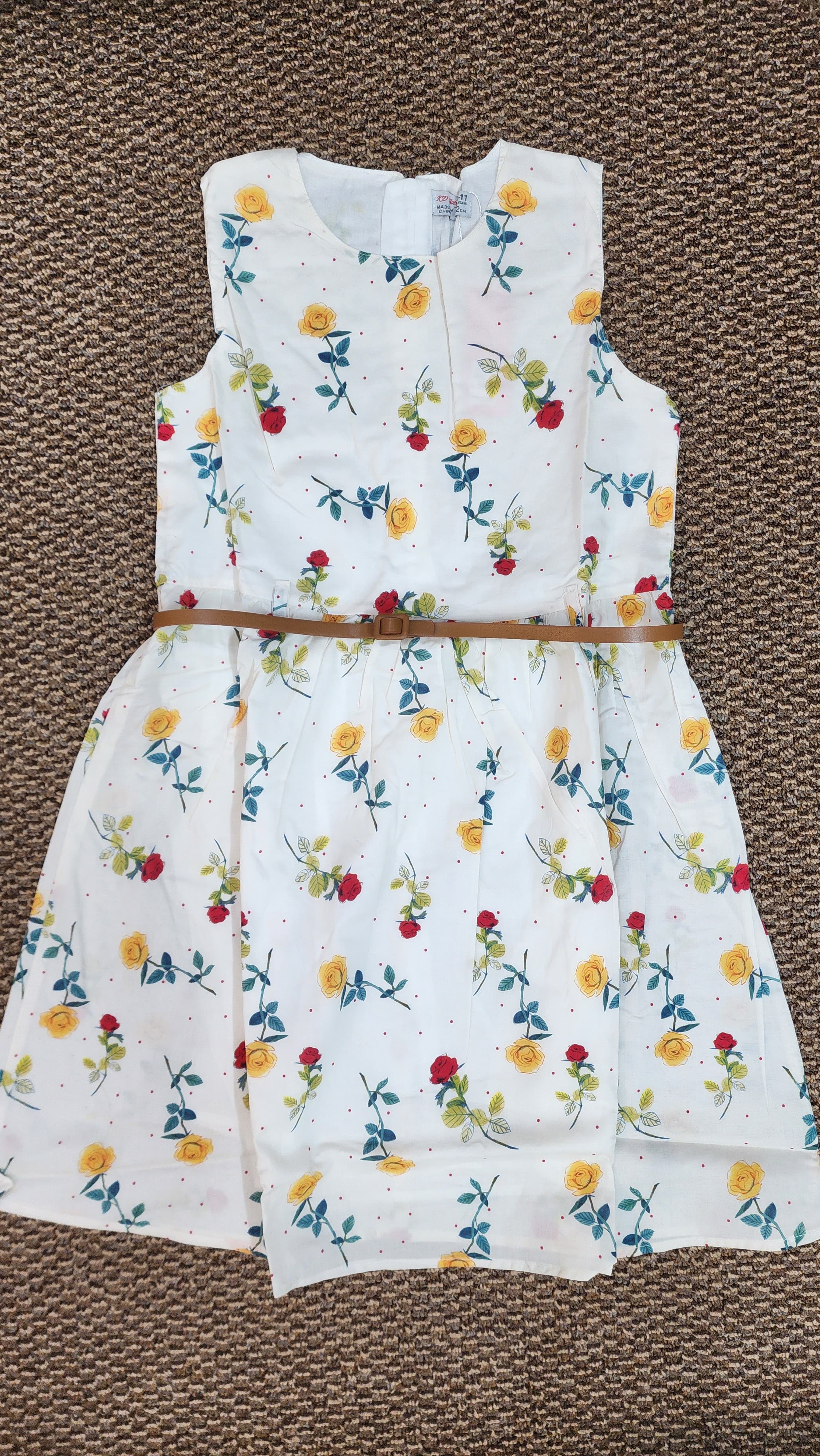 Floral print sleeveless dress with belt