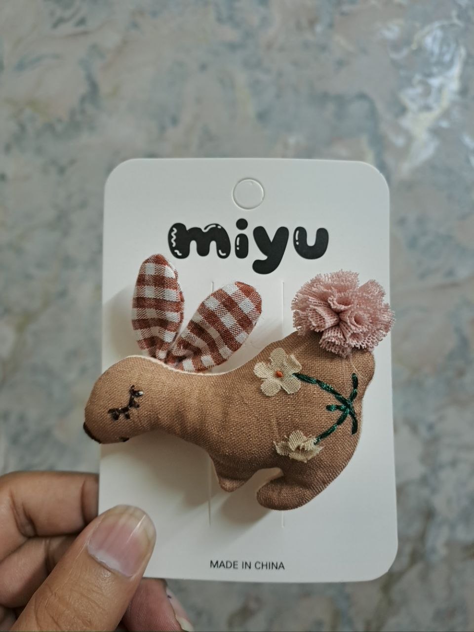 Miyu brand plush bunny hair clip with embroidered sleeping face, gingham check ears, and pom-pom tail for girls