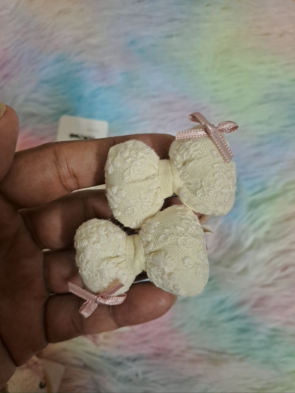 Miyu brand cream-colored fabric bow hair ties with textured lace material and pink ribbon accents for girls