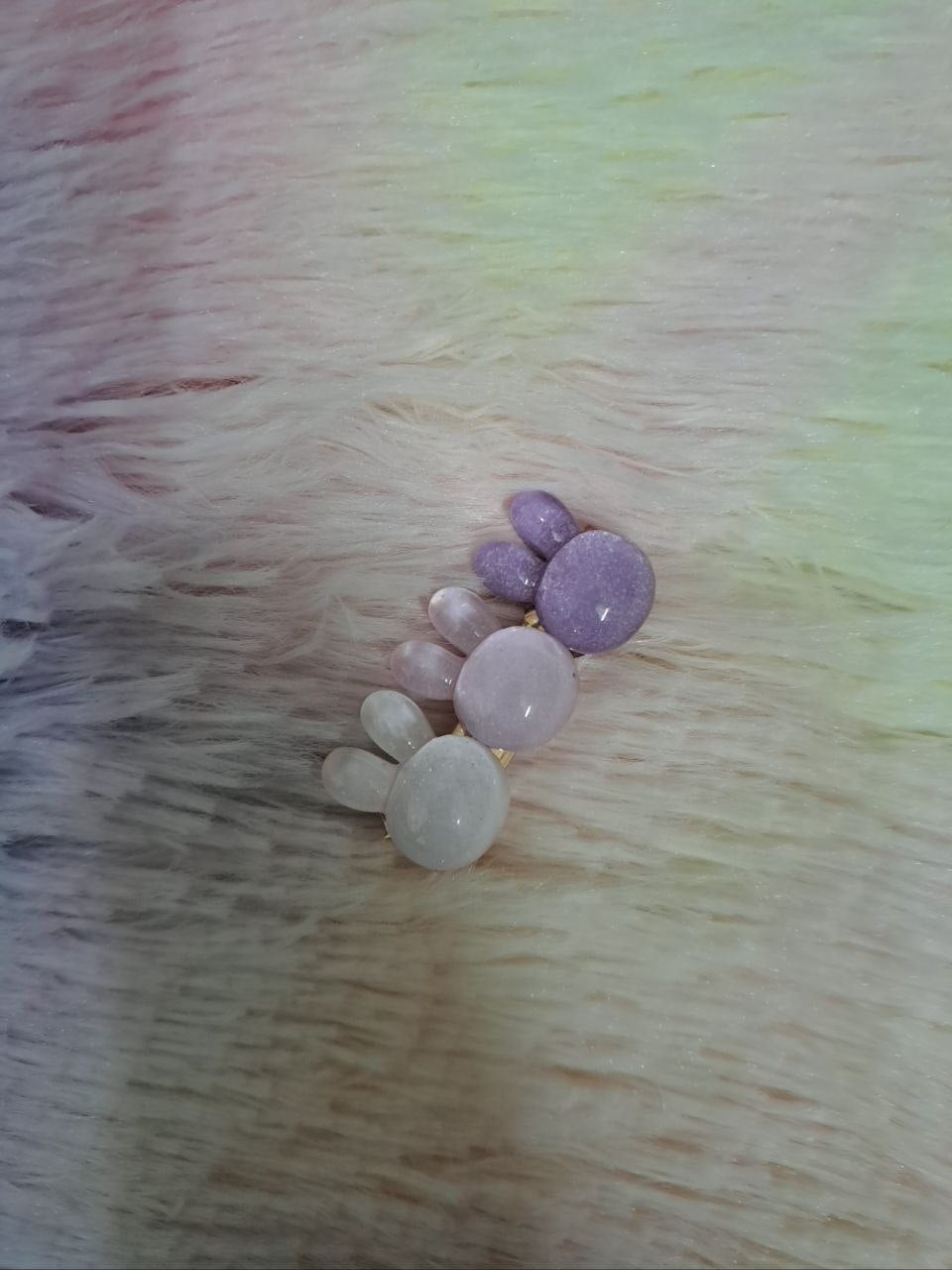 Assorted glossy resin hair clips in star, heart, flower, and bead shapes with smooth colorful finish for girls