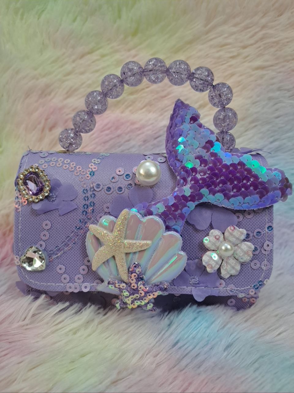 Lavender purple lace evening bag with iridescent holographic mermaid tail, glitter starfish, holographic shell, and purple crystal bead handle for girls