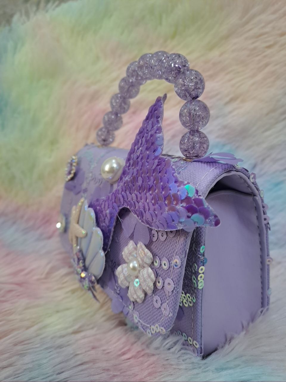 Lavender purple lace evening bag with iridescent holographic mermaid tail, glitter starfish, holographic shell, and purple crystal bead handle for girls