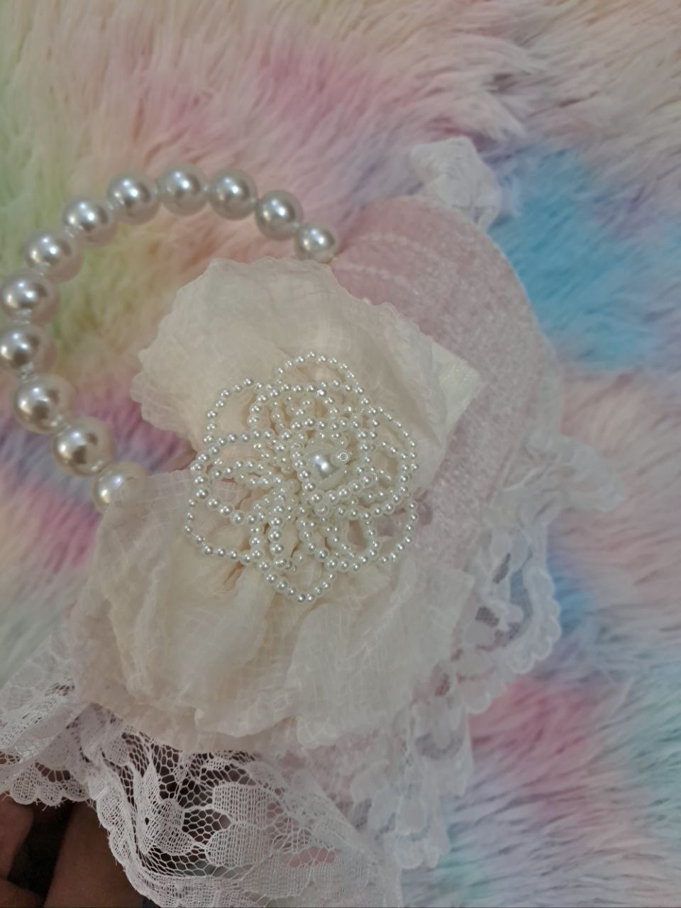 Soft pink sequined evening bag with elaborate delicate lace trim, pearl bead handle, and ivory tulle flower for girls
