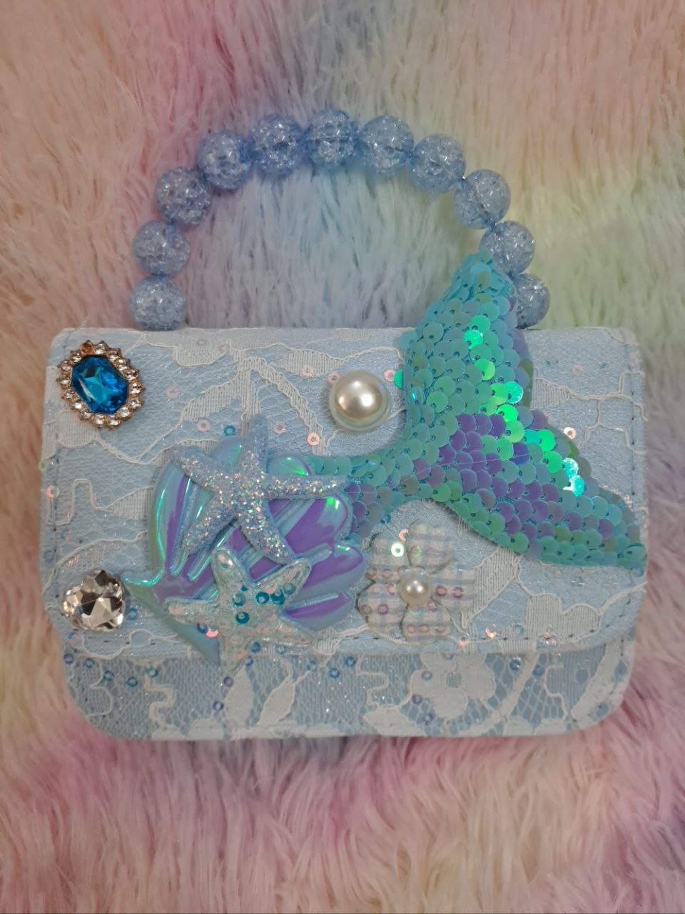 Turquoise brocade lace evening bag with elaborate iridescent mermaid tail, glitter starfish, holographic shell, and clear crystal handle for girls
