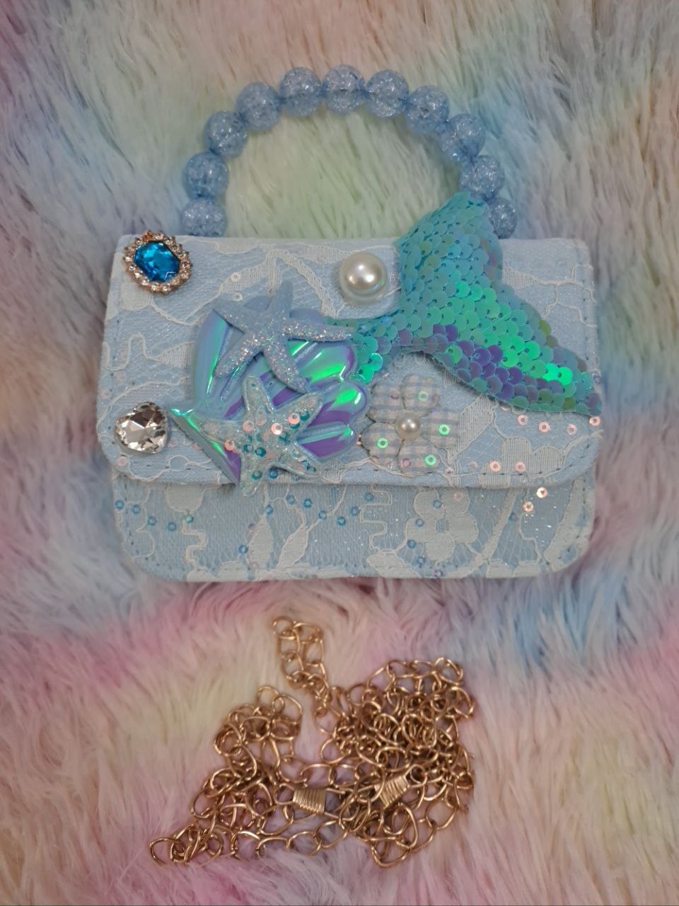Turquoise brocade lace evening bag with elaborate iridescent mermaid tail, glitter starfish, holographic shell, and clear crystal handle for girls