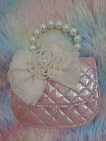Rose gold pink crystal-covered quilted evening bag with pearl bead handle and ivory tulle flower for girls