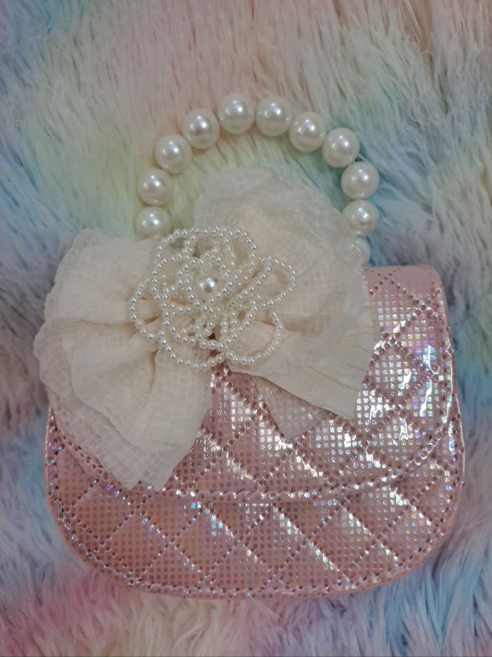 Rose gold pink crystal-covered quilted evening bag with pearl bead handle and ivory tulle flower for girls