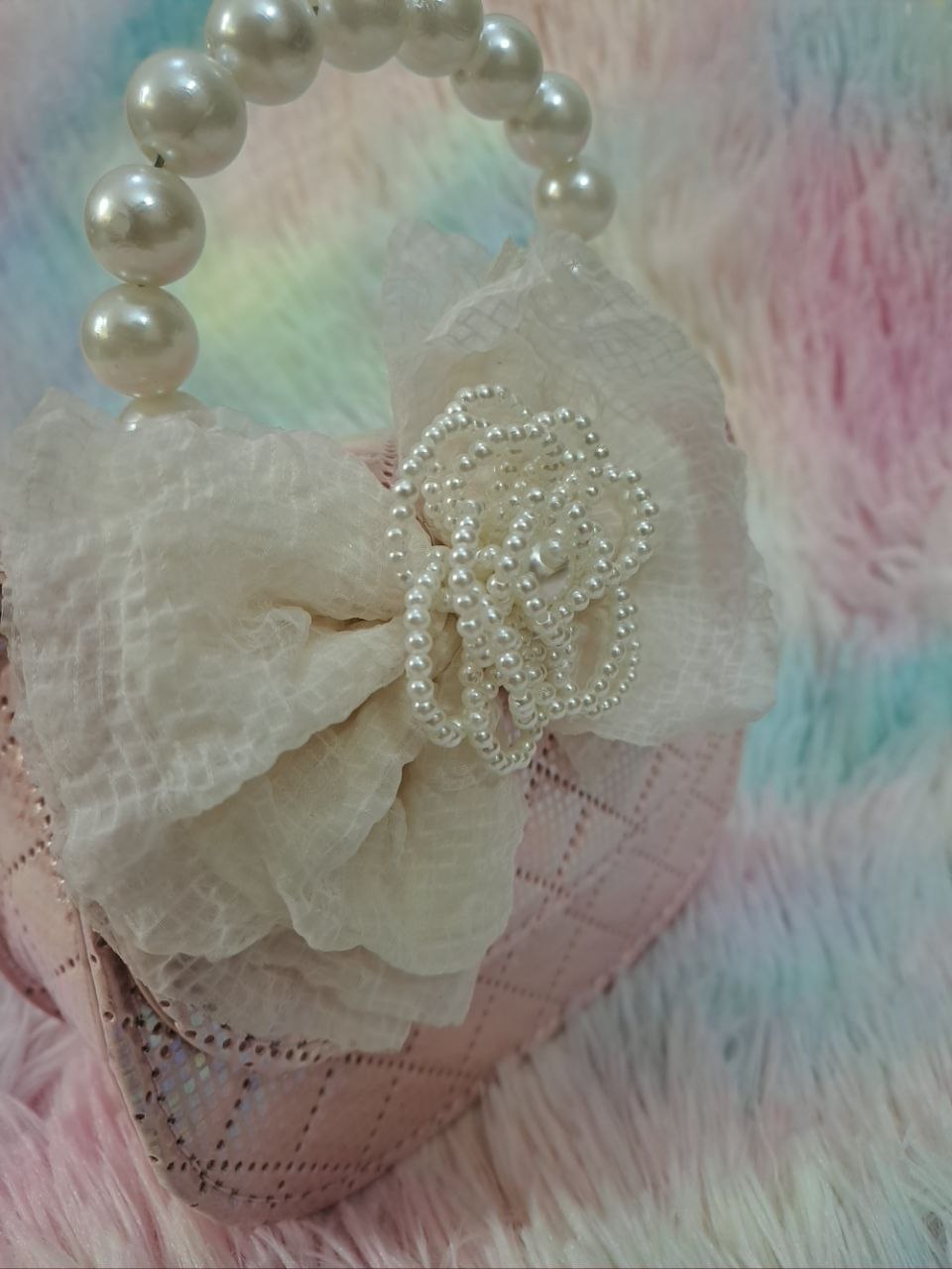 Rose gold pink crystal-covered quilted evening bag with pearl bead handle and ivory tulle flower for girls