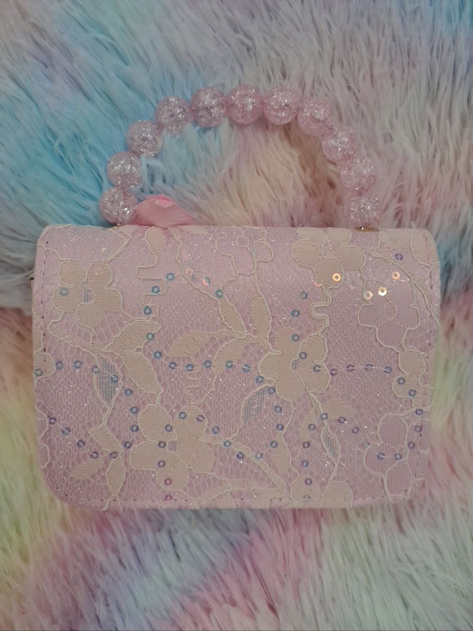 Pink lace evening bag with iridescent holographic shell, glitter starfish, pearl flower, and pink crystal bead handle for girls