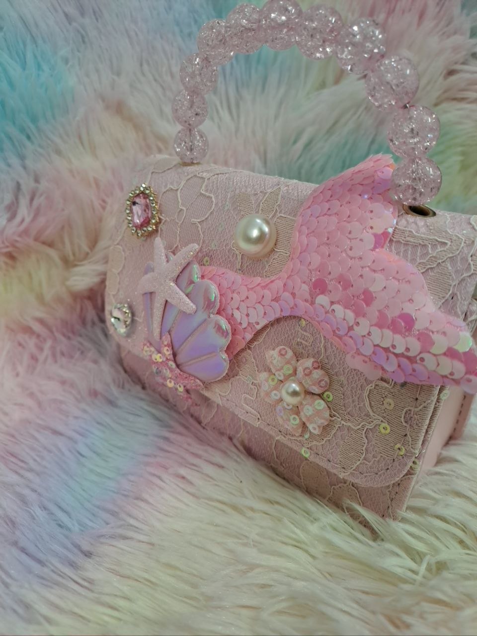 Pink bag with iridescent holographic shell, glitter starfish, pearl flower, and pink crystal bead handle for girls