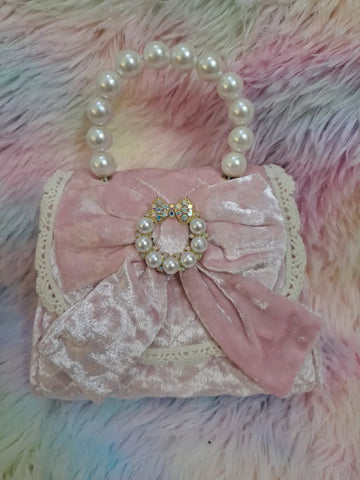 Pink crushed velvet evening bag with pearl bead handle, large satin bow with jeweled and pearl brooch centerpiece for girls
