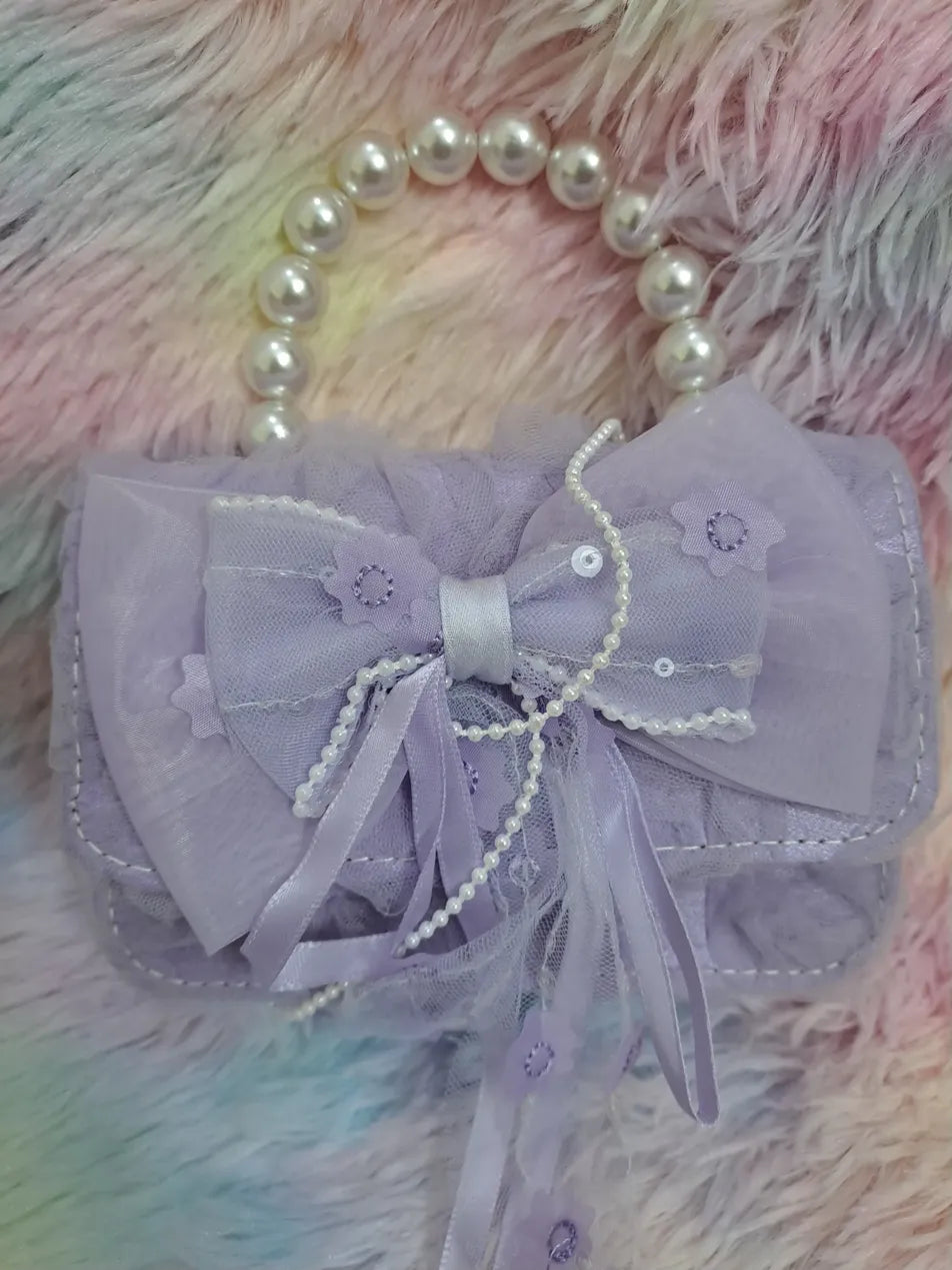 Lavender evening bag with lace details, pearl bead handle, tulle bow with embroidered flowers and pearl strand accents for girls
