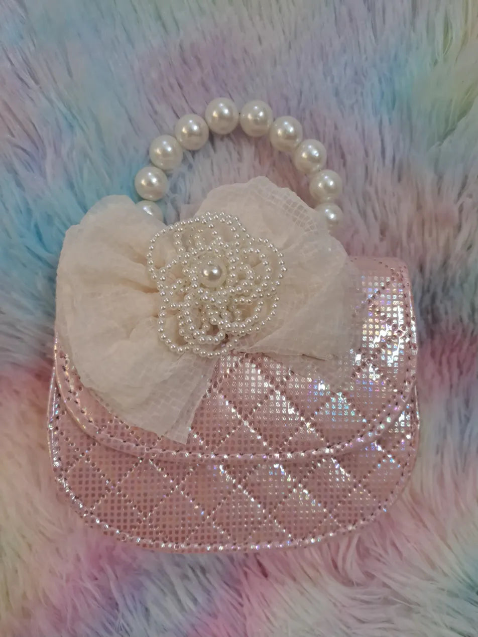 Rose gold iridescent crystal-covered quilted evening bag with pearl bead handle and ivory tulle flower for girls