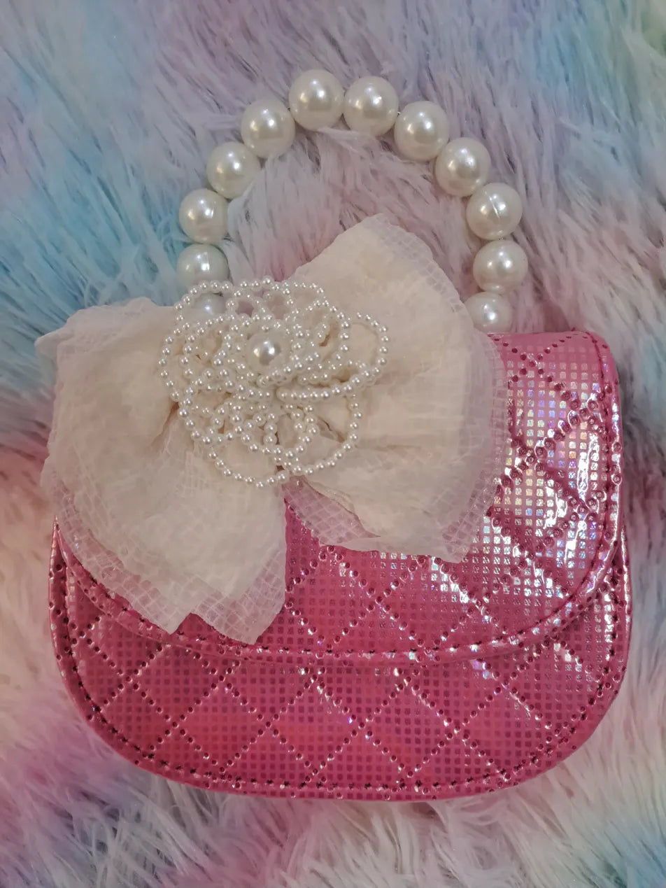 Rose gold iridescent crystal-covered quilted evening bag with pearl bead handle and ivory tulle flower for girls