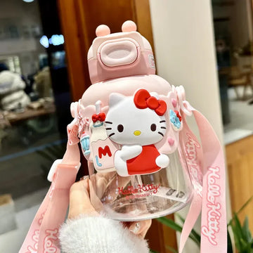 Pink Hello Kitty 3D sculpted Sanrio official kids straw water bottle with red bow character figure, robot-shaped lid, and printed Hello Kitty shoulder strap