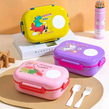 Kids cartoon four-clip latch lunch box set featuring Aviator Dino yellow, Fantastic Unicorn purple, and Enthusiasm Flamingo pink designs, with circular name panel, included spoon and fork set, BPA-free microwave-safe school tiffin box
